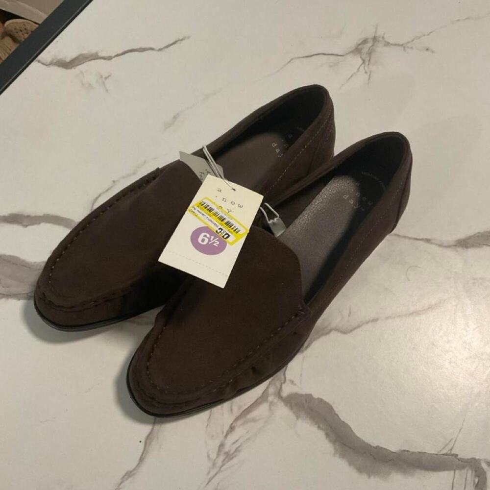 Brown suede loafers with a